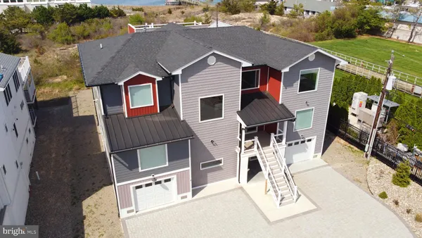 a bedroom with a bed and a walk in closet