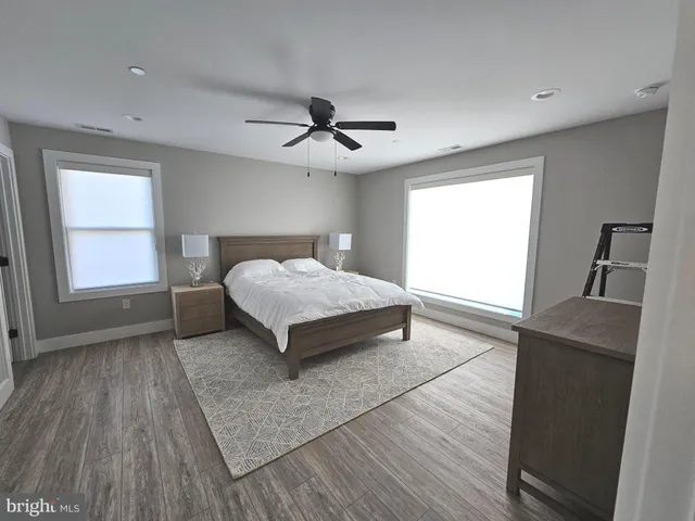 a bathroom with a bathtub and a sink