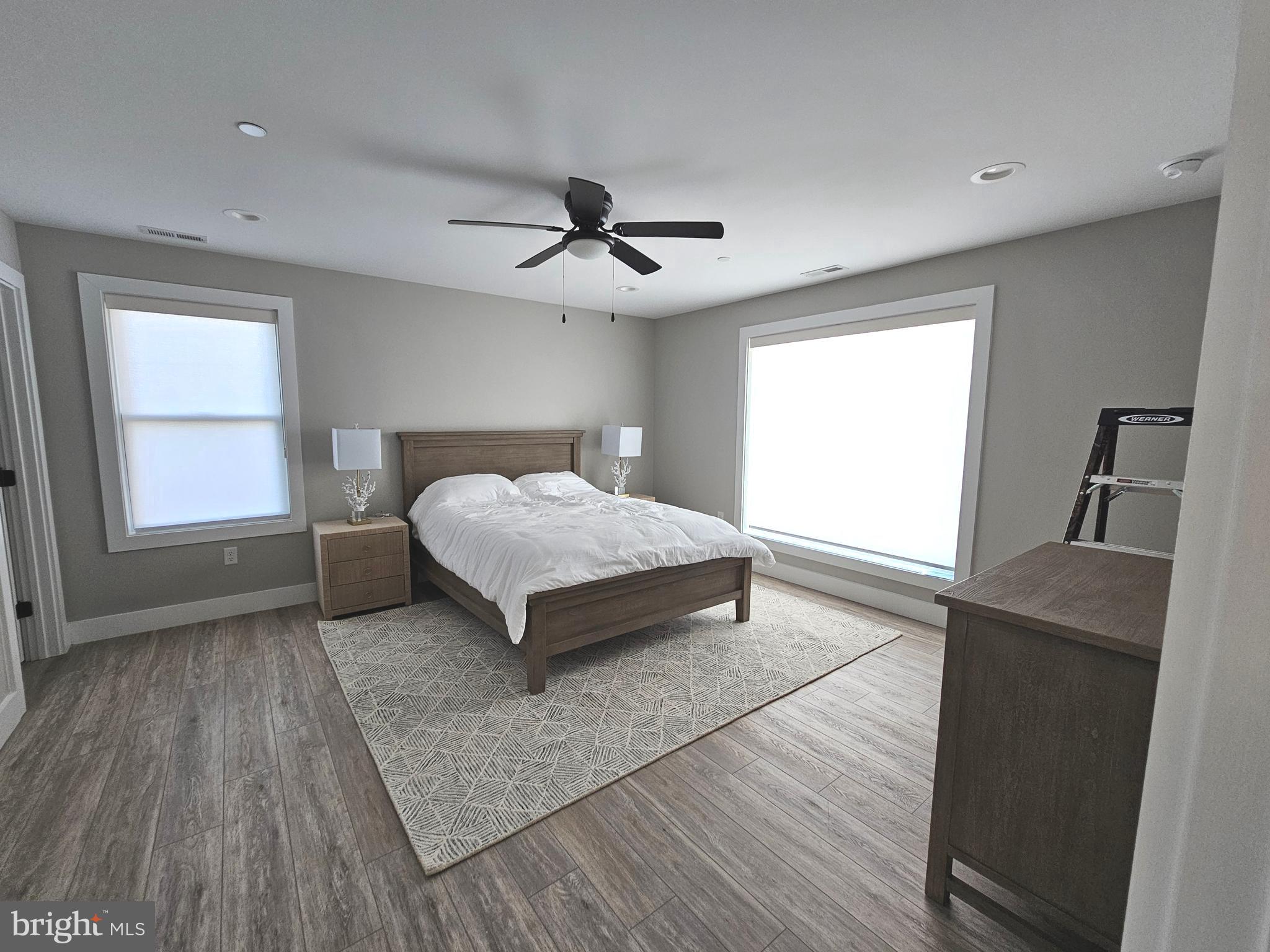 5 Warren Road Lewes, DE 19958 - Photo 23 of 76 a spacious bedroom with a bed and window