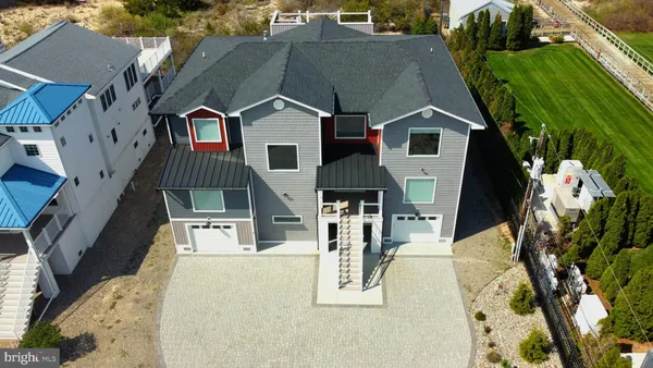 a front view of a house with yard