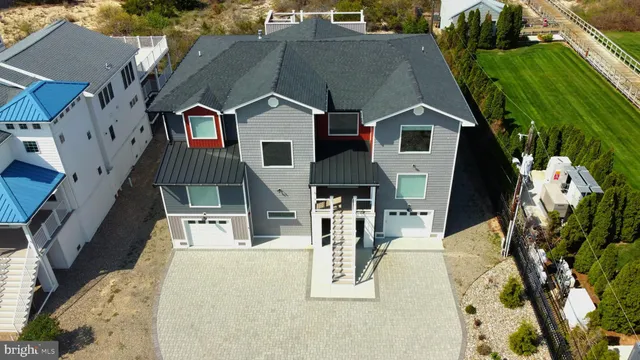 a front view of a house with yard