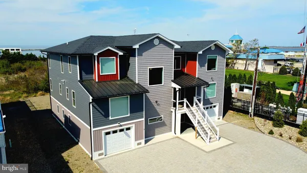 an aerial view of a house with garden