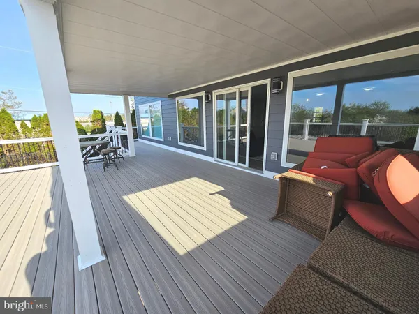 a bathroom with a sink toilet and mirror