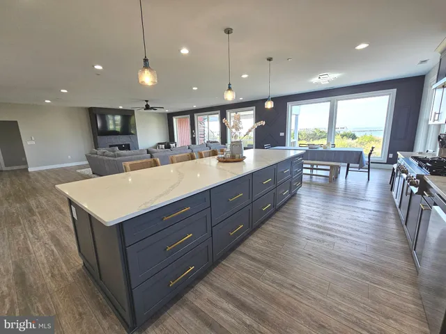 a view of a hallway with seating area