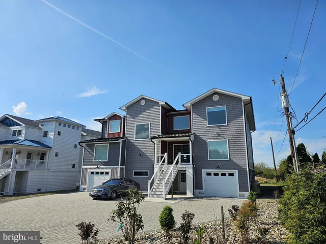 a view of a house with a sink and refrigerator