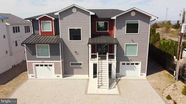 a large room with lots of counter space and windows