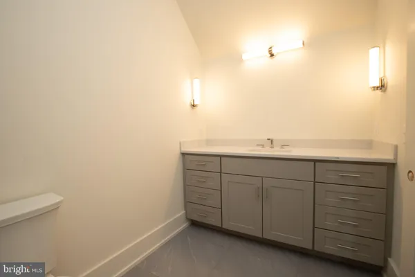 a bathroom with a sink and a toilet