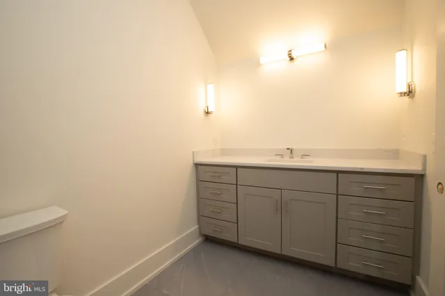 a bathroom with a sink and a toilet