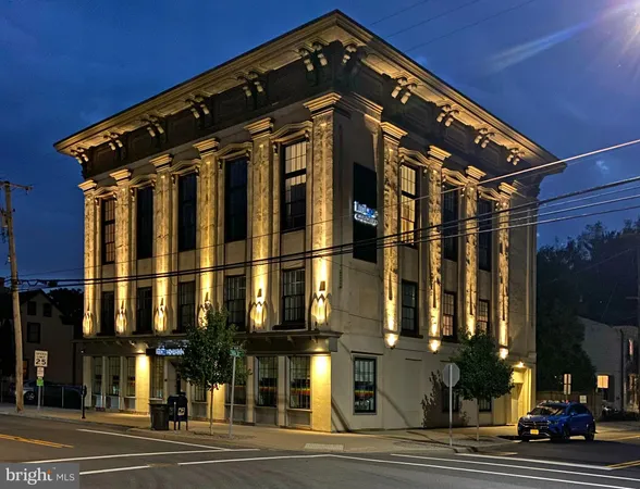a view of a building and a street light