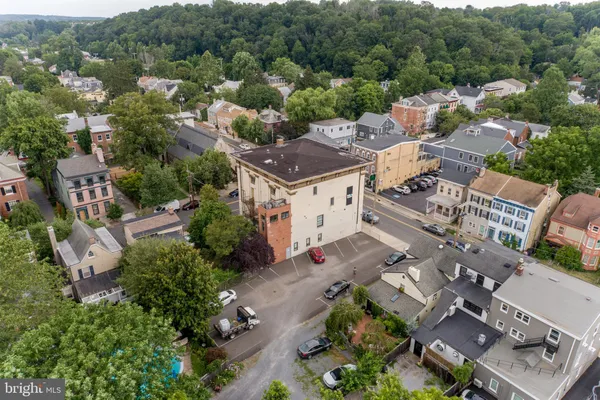 a view of a cars parked in front of a house