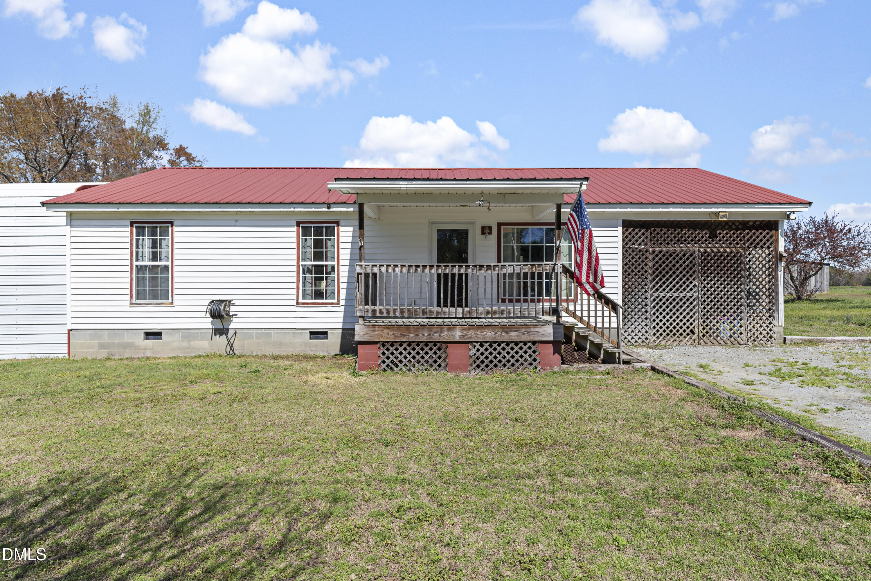 288 Baileys Crossroads Road Benson, NC 27504 - Photo 1 of 26 a house view with a garden space