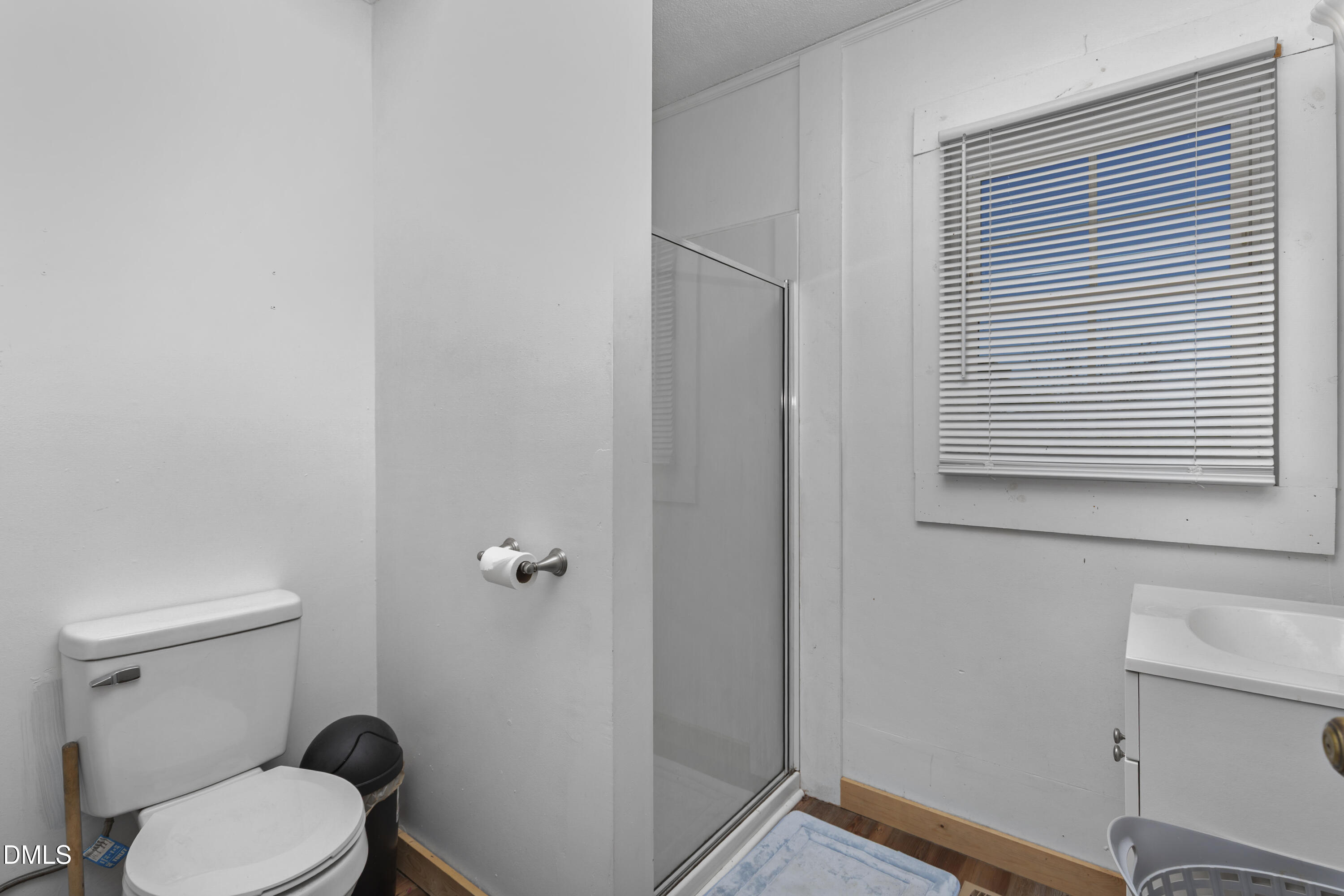 288 Baileys Crossroads Road Benson, NC 27504 - Photo 17 of 26 a white toilet sitting next to a bathroom sink