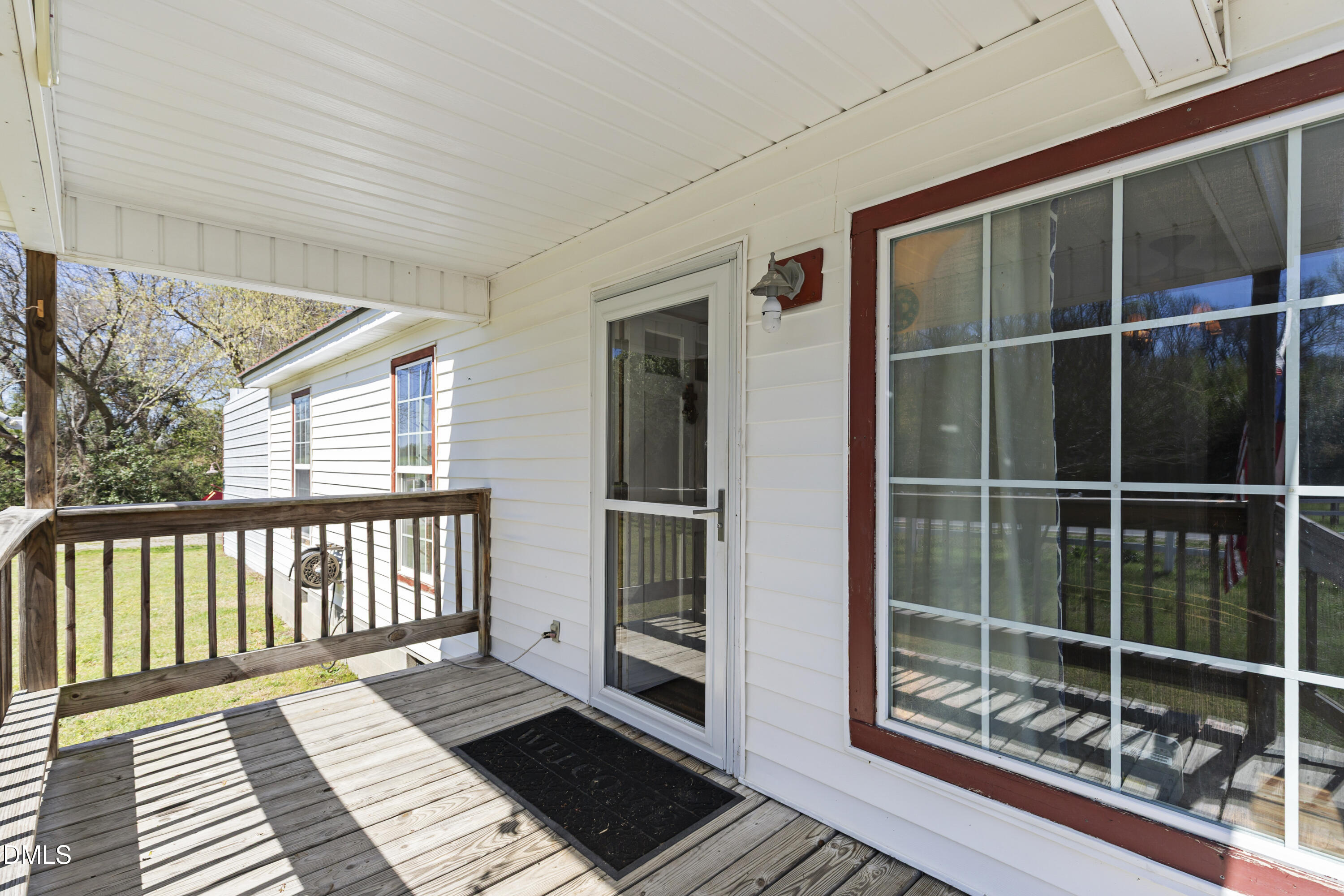 288 Baileys Crossroads Road Benson, NC 27504 - Photo 3 of 26 a view of a balcony with wooden floor