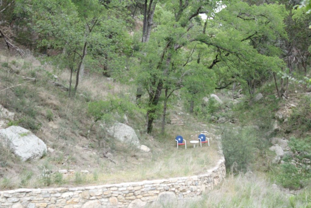 5255 Lookout Ridge Drive Marble Falls, TX 78654 - Photo 34 of 40 Lower level of Lot with retaining wall near Lake Travis shoreline access