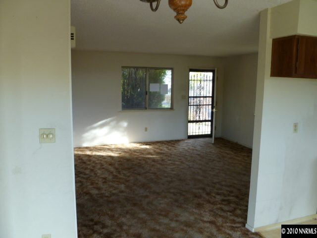 6720 Peppermint Drive Reno, NV 89506 - Photo 6 of 7 an empty room with windows