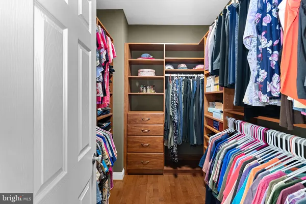 a room with furniture and pool table