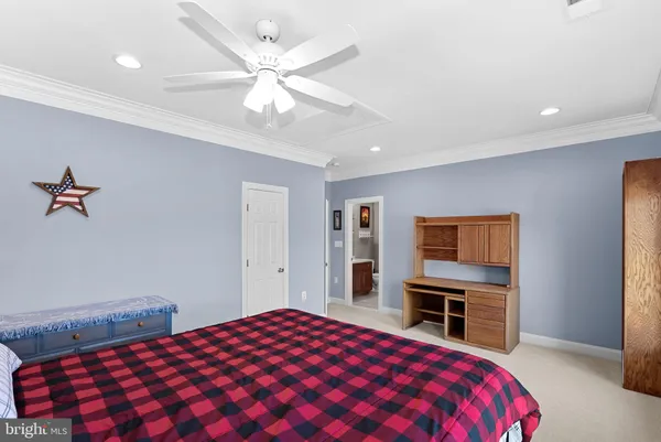 an aerial view of a house with a garden
