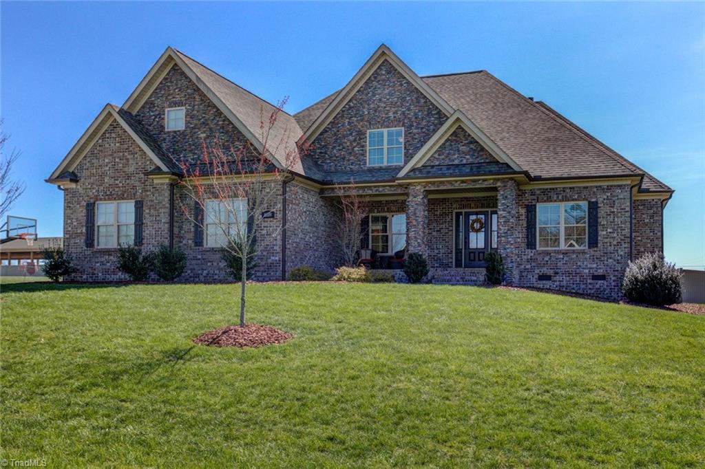 Welcome to 8889 Rymack Dr, Oak Ridge! A stunning 4 bedrooms plus bonus room home on almost an acre with a privacy fenced, level yard.  Oak Ridge Elementary