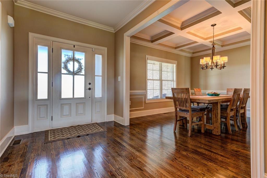 8889 Rymack Drive Oak Ridge, NC 27310 - Photo 2 of 30 Welcome home! Enjoy beautiful hardwoods in this custom home.