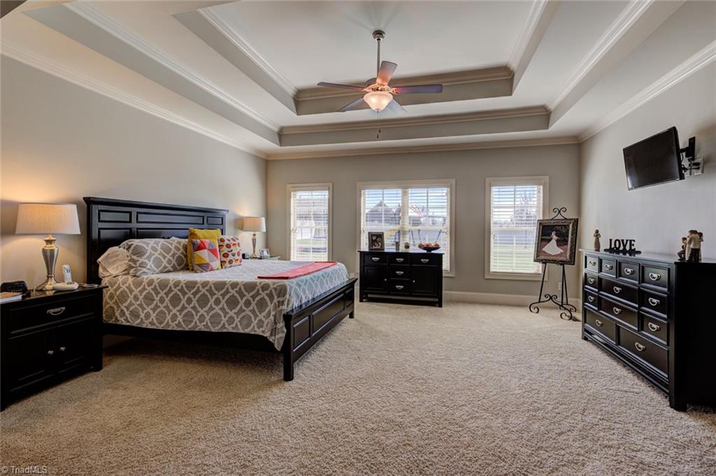 8889 Rymack Drive Oak Ridge, NC 27310 - Photo 13 of 30 Main level master bedroom suite