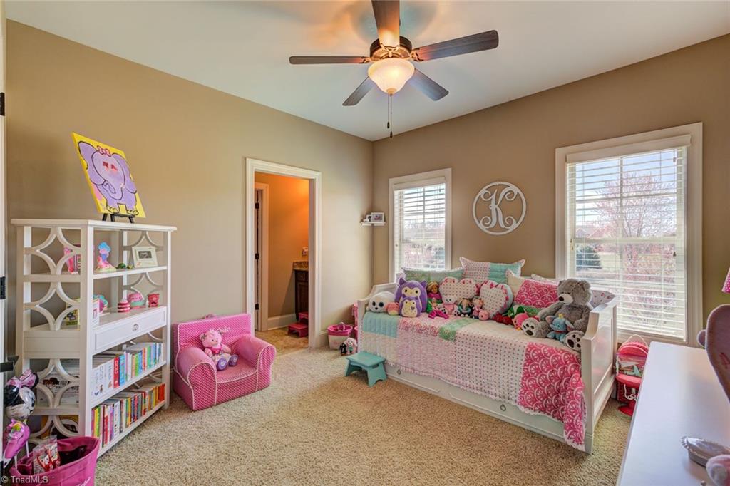 8889 Rymack Drive Oak Ridge, NC 27310 - Photo 21 of 30 Main level bedroom with access to Jack and Jill bathroom