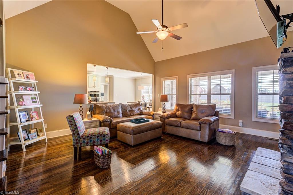 8889 Rymack Drive Oak Ridge, NC 27310 - Photo 5 of 30 Expansive Great Room with vaulted ceiling.