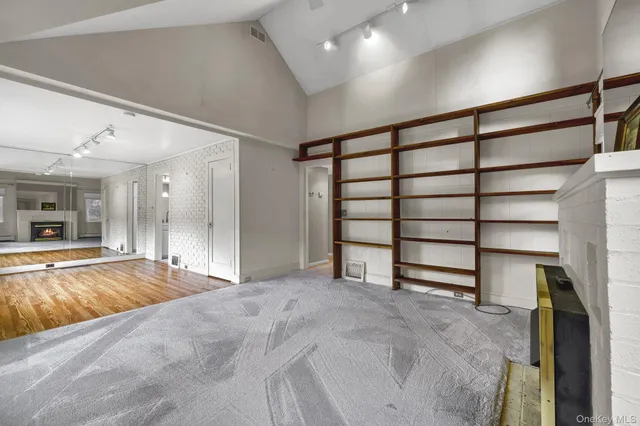 a view of a livingroom with a staircase