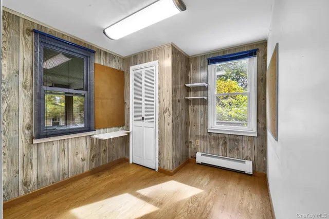 a view of an empty room and window