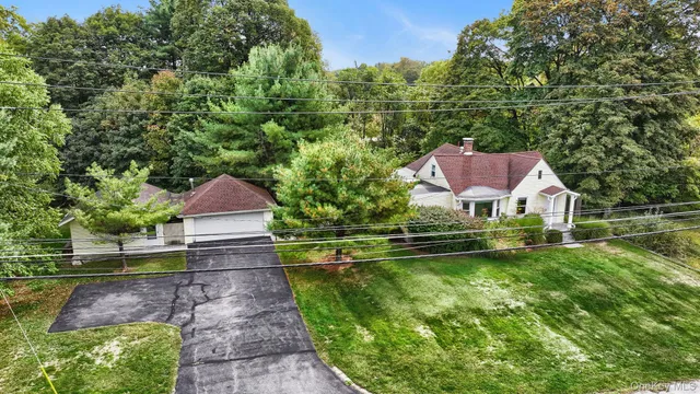 a house view with a garden space