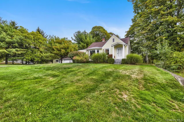 a view of a house with a big yard