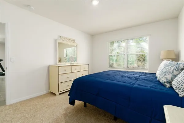a bathroom with double sink and a mirror
