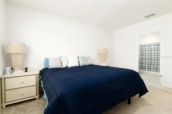 a view of room with workspace and mirror