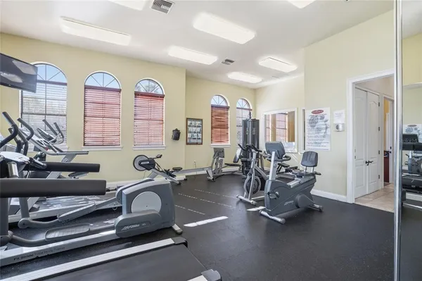 a view of a lake with houses in the back
