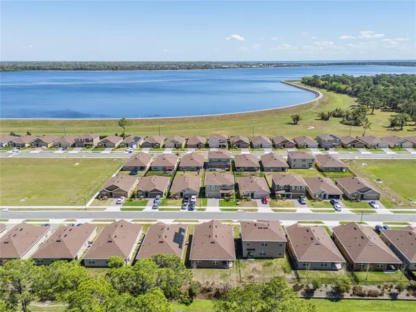 a kitchen with stainless steel appliances a refrigerator stove microwave and sink