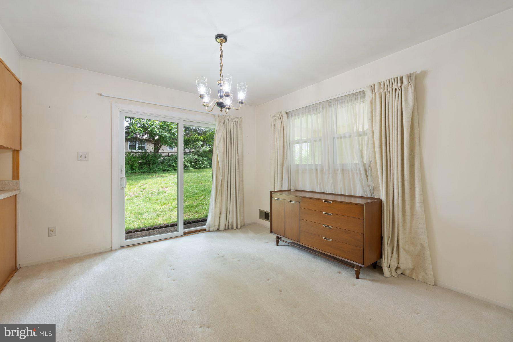 5304 Moultrie Road Springfield, VA 22151 - Photo 18 of 38 a view of an empty room with a window