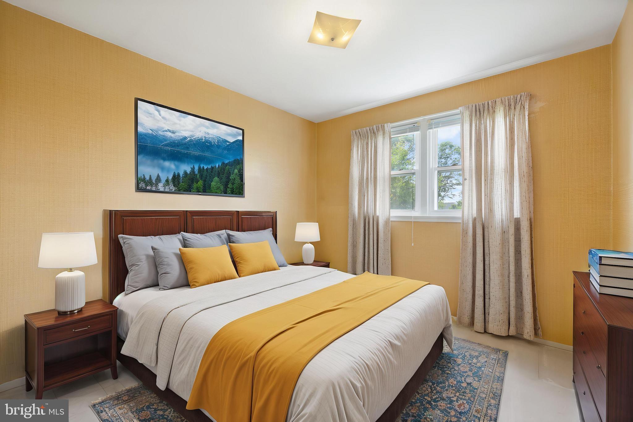 5304 Moultrie Road Springfield, VA 22151 - Photo 20 of 38 a bedroom with bed and wooden floor