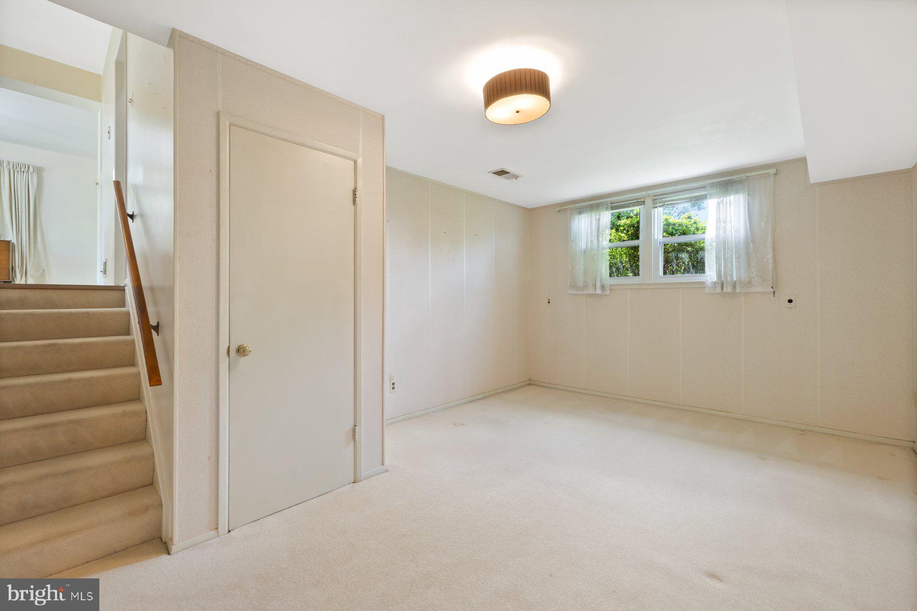 5304 Moultrie Road Springfield, VA 22151 - Photo 27 of 38 a view of an empty room with a window