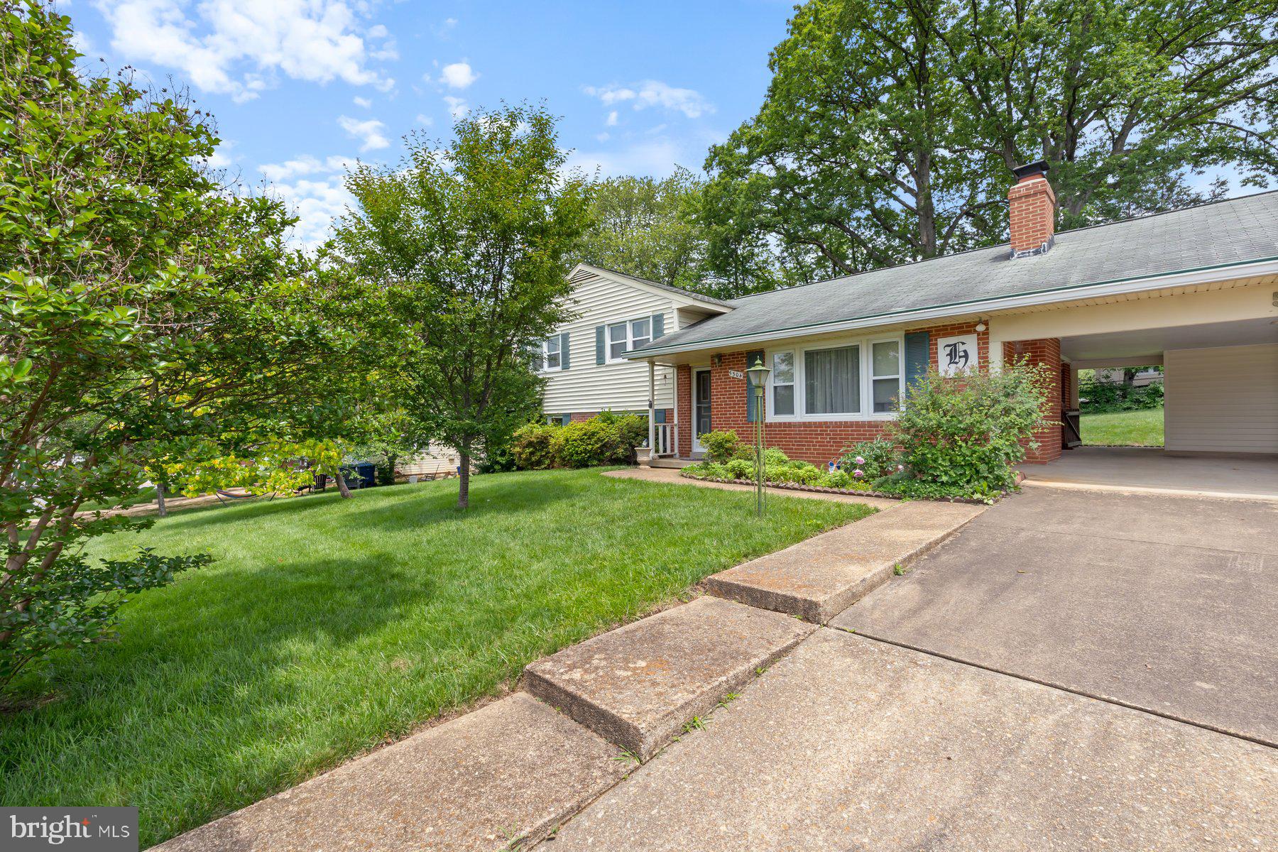 5304 Moultrie Road Springfield, VA 22151 - Photo 3 of 38 a front view of house with yard and green space