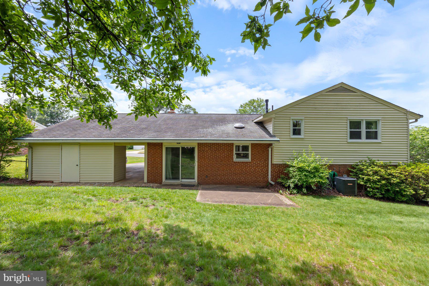 5304 Moultrie Road Springfield, VA 22151 - Photo 6 of 38 front view of a house with a yard