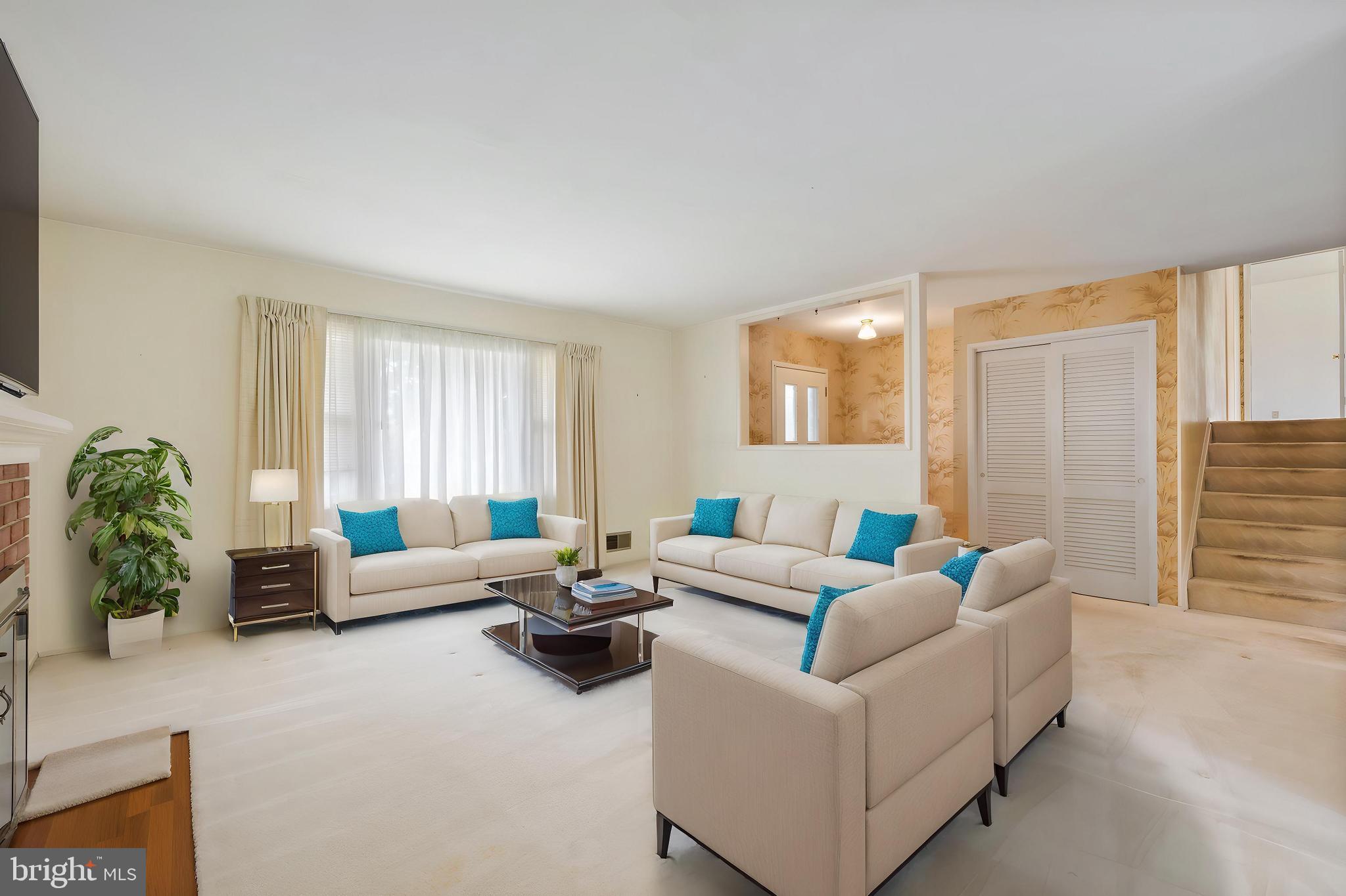 5304 Moultrie Road Springfield, VA 22151 - Photo 8 of 38 a living room with furniture and a large window