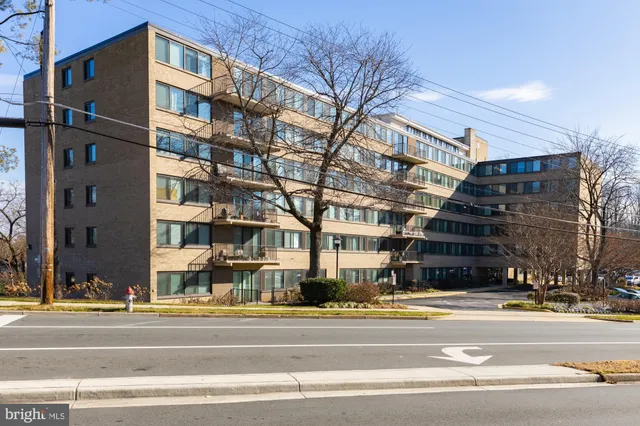 a view of a building and a street