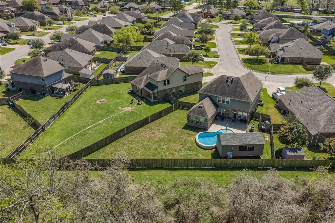 1827 Basin Trail Brenham, TX 77833 - Photo 34 of 38 an aerial view of a house with a yard