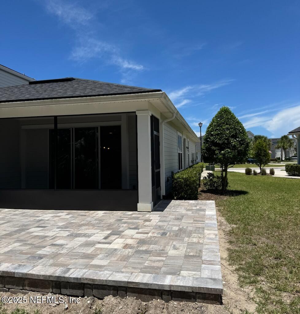133 Leeward Island Drive St. Augustine, FL 32080 - Photo 27 of 48 a view of a house with a yard