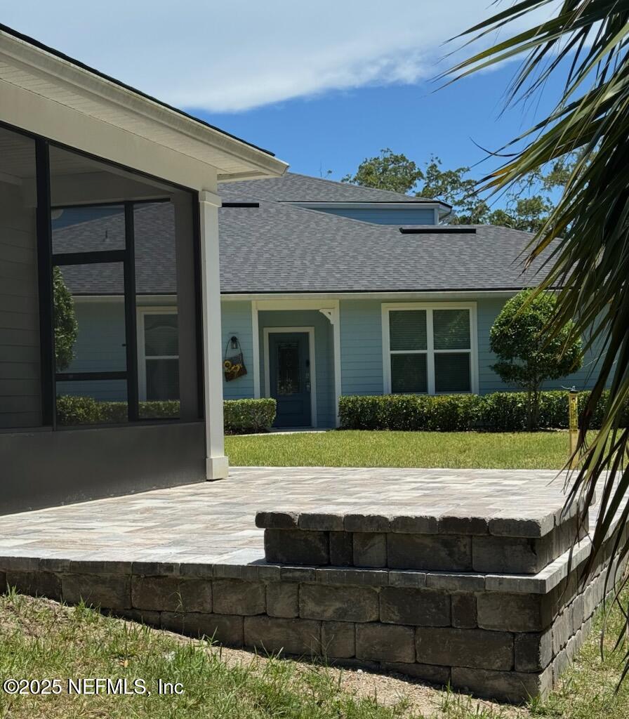 133 Leeward Island Drive St. Augustine, FL 32080 - Photo 28 of 48 a view of house with outdoor space