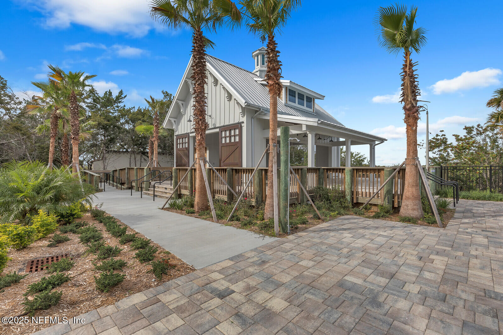133 Leeward Island Drive St. Augustine, FL 32080 - Photo 30 of 48 a view of a house with a wooden fence