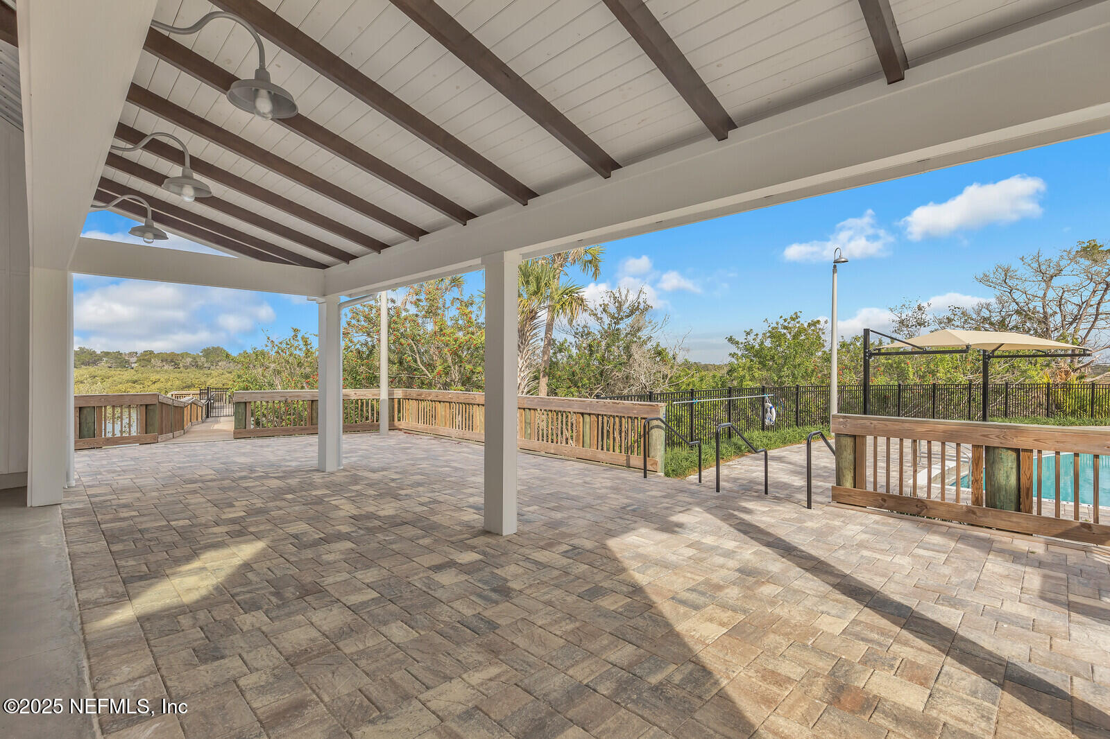 133 Leeward Island Drive St. Augustine, FL 32080 - Photo 35 of 48 a view of an empty room with a balcony