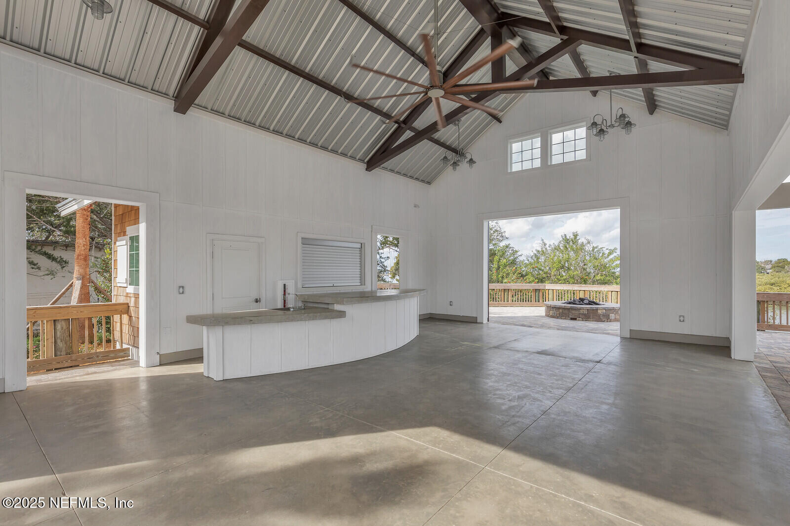 133 Leeward Island Drive St. Augustine, FL 32080 - Photo 38 of 48 a view of a kitchen with a sink and a large window