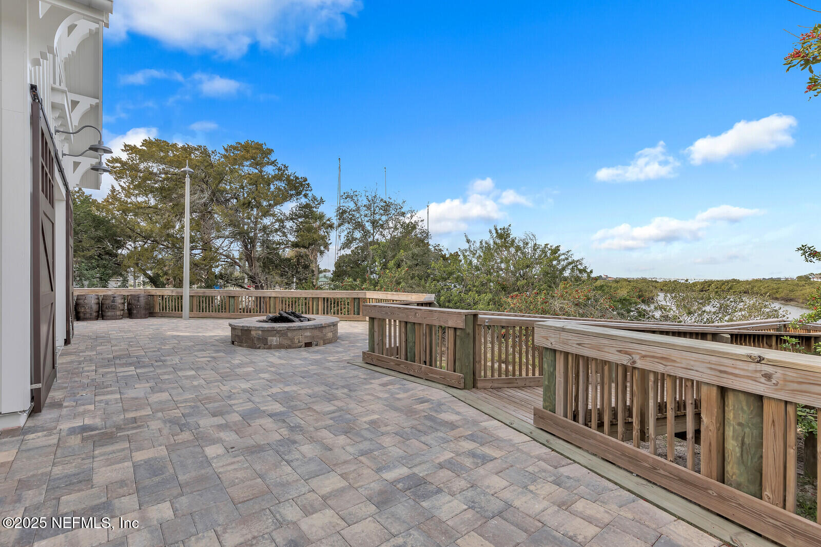 133 Leeward Island Drive St. Augustine, FL 32080 - Photo 44 of 48 a view of a terrace with a bench