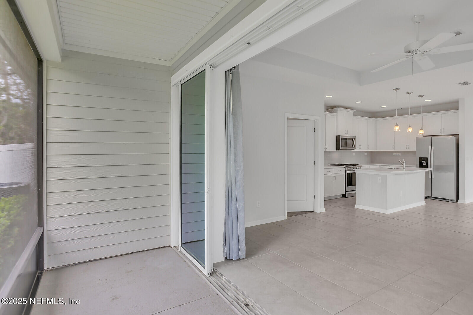 133 Leeward Island Drive St. Augustine, FL 32080 - Photo 7 of 48 a view of a kitchen with white cabinets