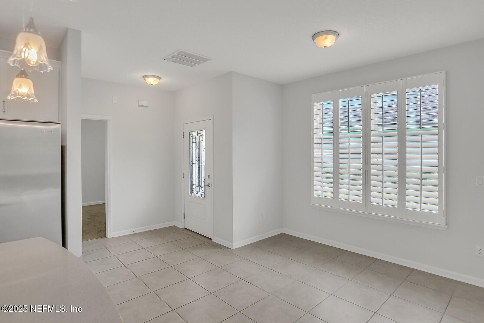 133 Leeward Island Drive St. Augustine, FL 32080 - Photo 9 of 48 a view of an empty room with a window